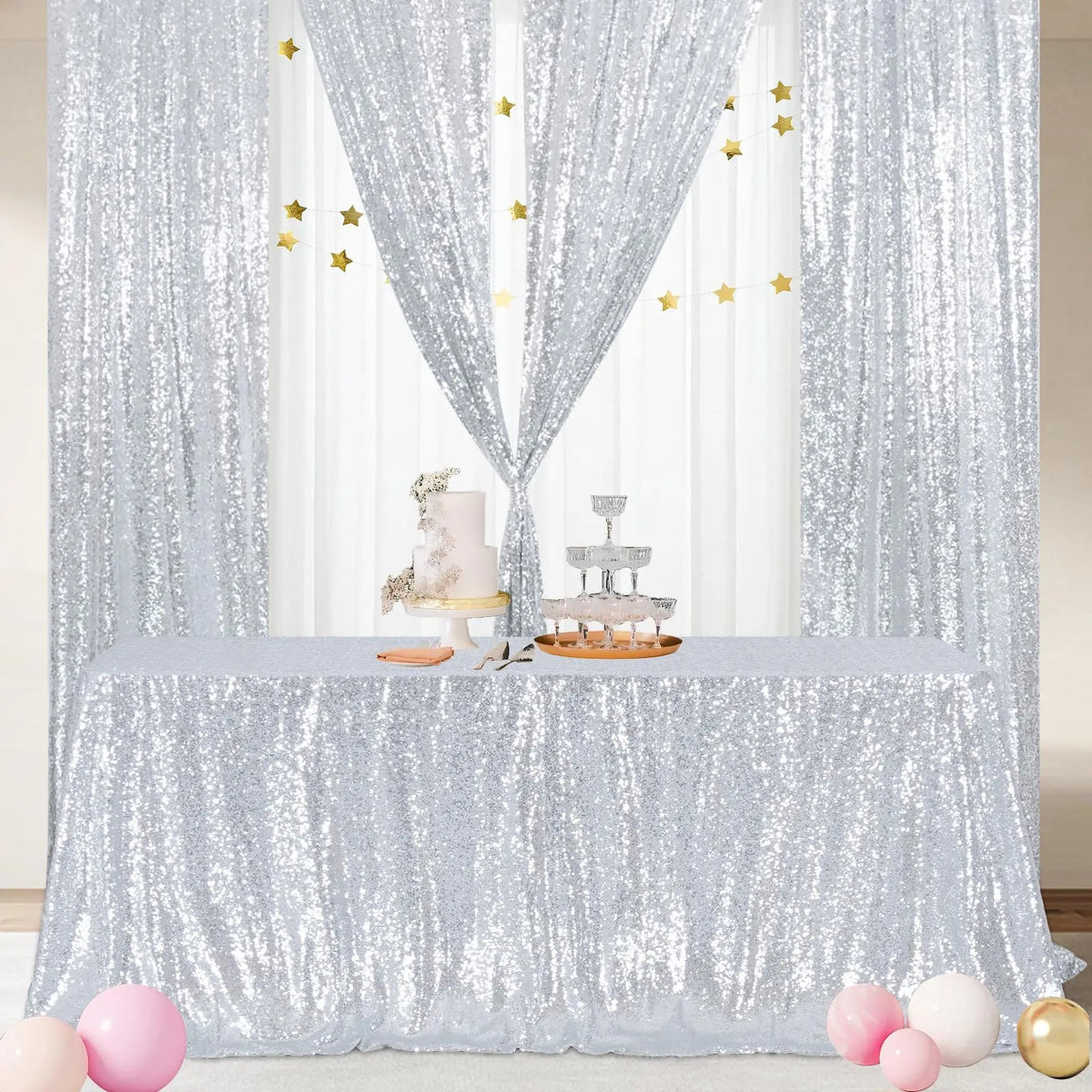 Table de fête pastel avec nappe scintillante argentée