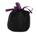 Variante noire à détails violets du sac cadeau Halloween