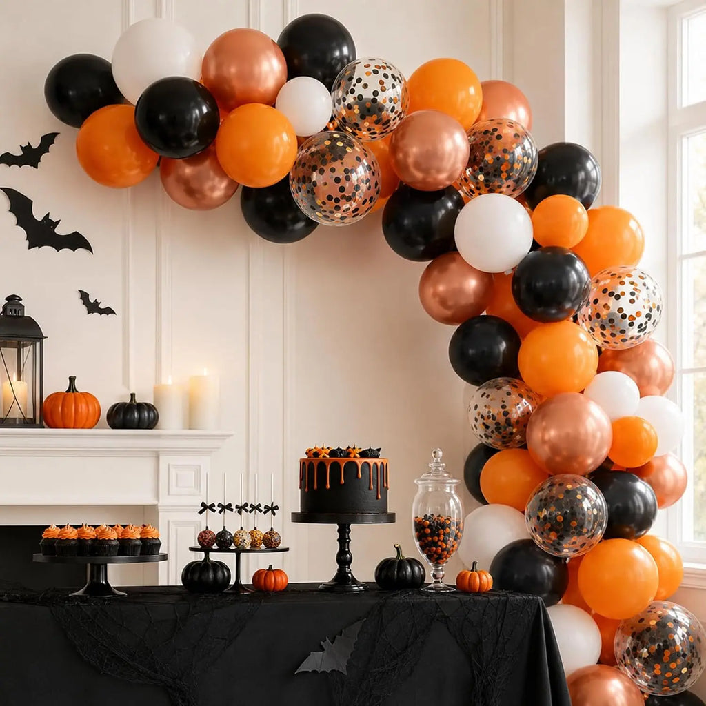 Ballons Halloween orange et noirs : guirlande de ballons autour d’un buffet.