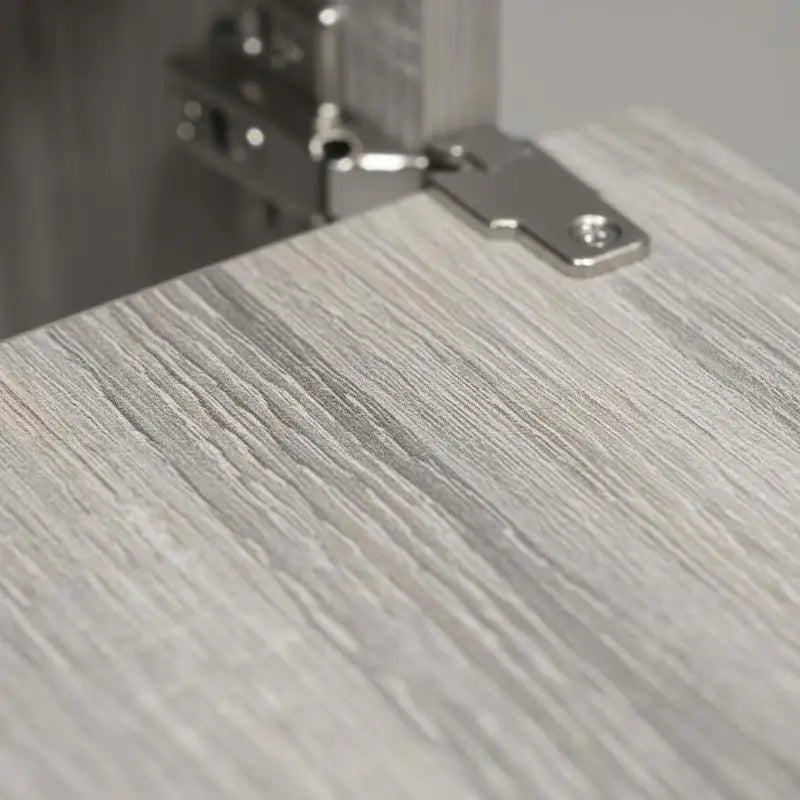 Meuble WC avec porte-rouleau intégré et porte réversible