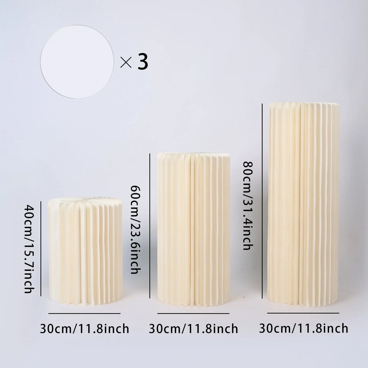 Colonne décorative pliante en papier blanc : lot de trois hauteurs 40, 60 et 80 cm.