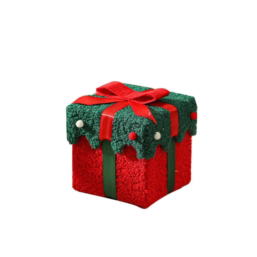 Boîte cadeau rouge et verte à nœud