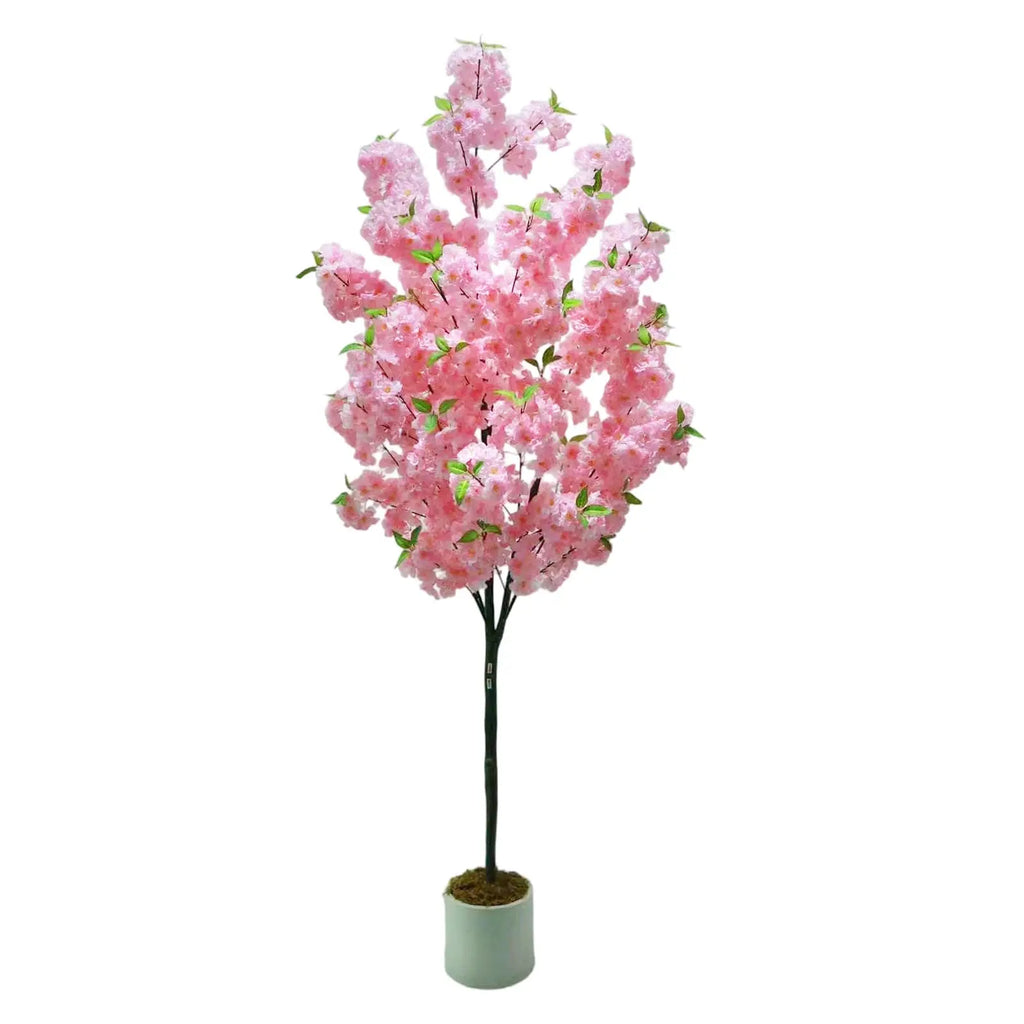 Arbre artificiel de cerisier en pot, fleurs roses, tige sombre et base de pot vert clair.