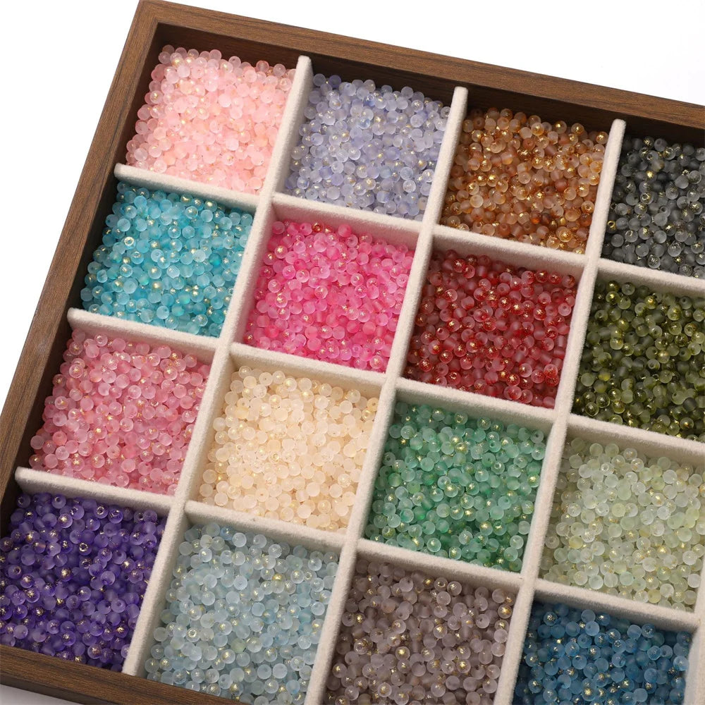 Présentation de perles en verre dans une boîte de rangement non incluse