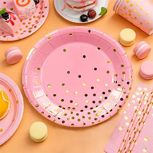 Vaisselle de fête rose et dorée à pois : deux formats d’assiettes.