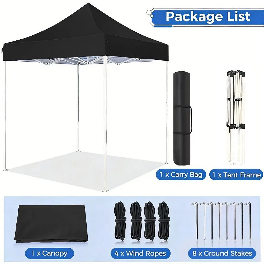 Pergola pliante noire avec sac de transport, cadre, cordes et piquets au sol.