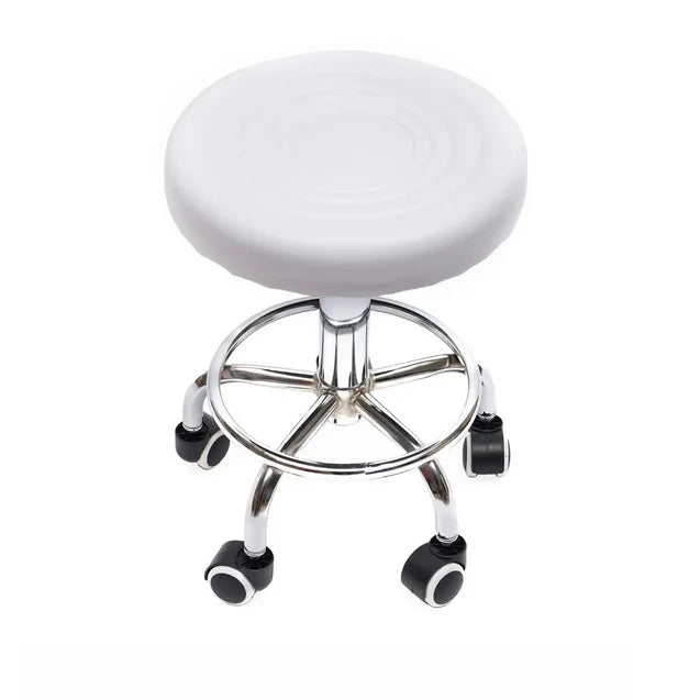 Tabouret à roulettes pivotant, hauteur réglable 45–57 cm — vue de dessus ivoire